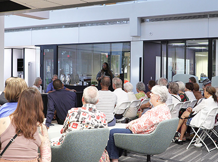 Crowd gathers to join The Studio@620 panel discussion at library