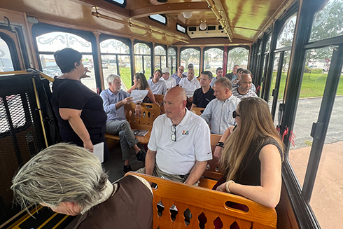 people riding the trolly