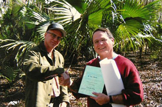 Thomas Hallock, then Visiting Scholar of Florida Studies, with Duckwall Professor of Florida Studies Gary Mormino