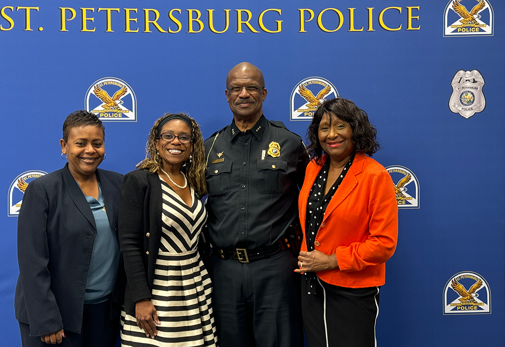 Chief Holloway with 3 females