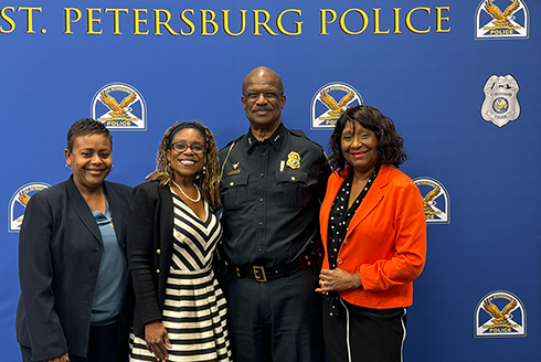 Chief Holloway with 3 females