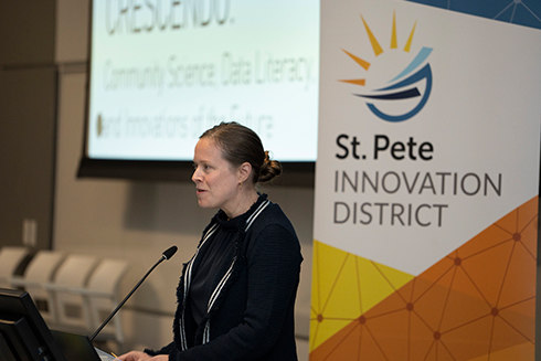 female speaker at podium