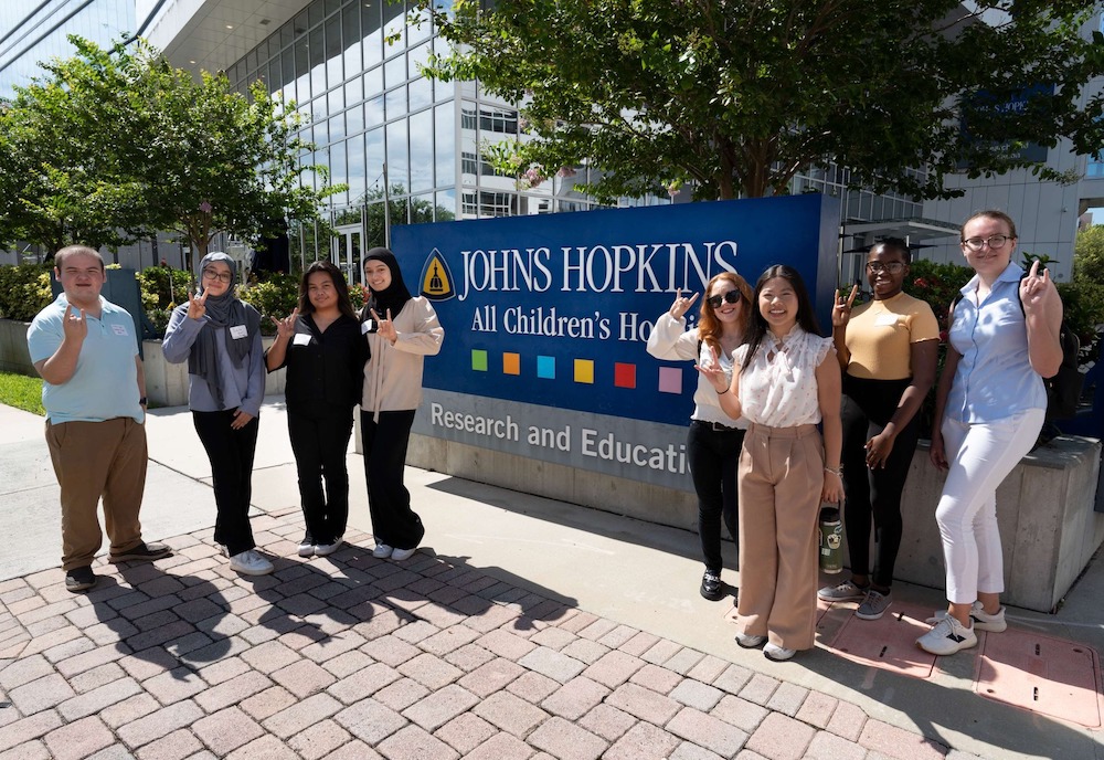 Several students go on a career service field trip to Johns Hopkins All Children’s Hospital as part of the Bulls in the Burg program.